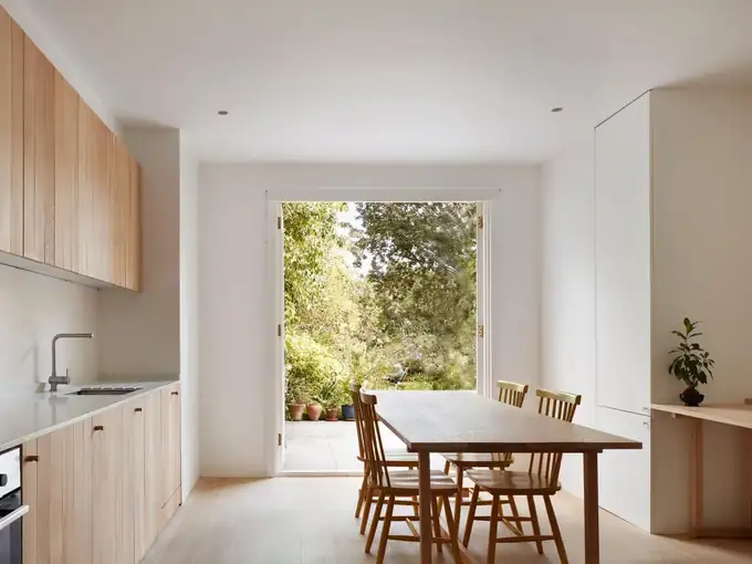 Finished kitchen and dining space looking out to the garden